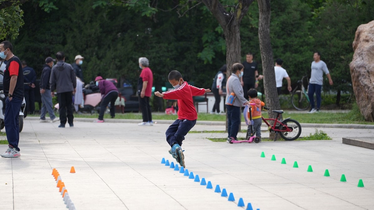 a boy jumping in the air